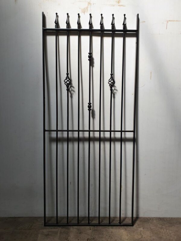 Black wrought iron side gate