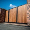sliding mcadam automatic metal framed timber iroko gates