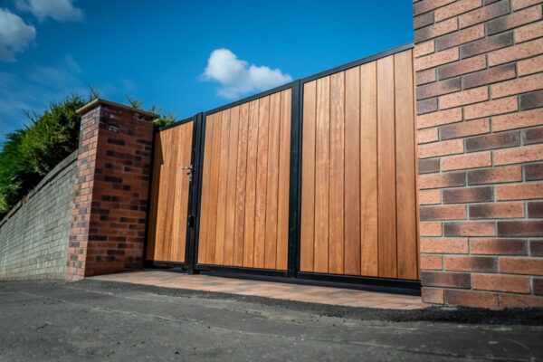 sliding mcadam automatic metal framed timber iroko gates
